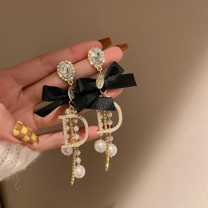 Elegant and fashionable women's bow tassel earrings