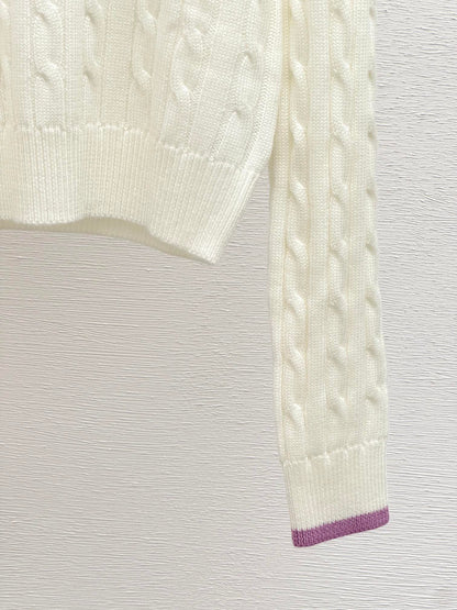 Contrast color cable knit long sleeve sweater