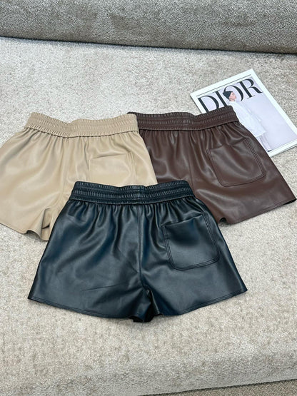 Metal buckle elastic high waist leather shorts