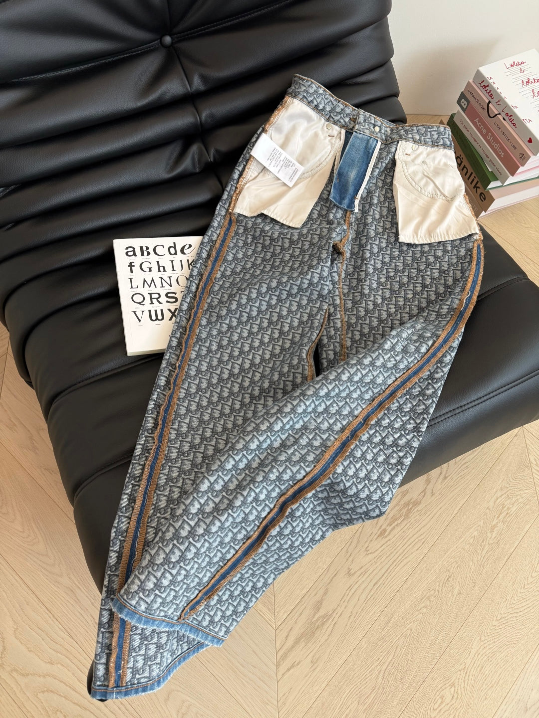 Straight-leg jeans with webbing panels on the sides