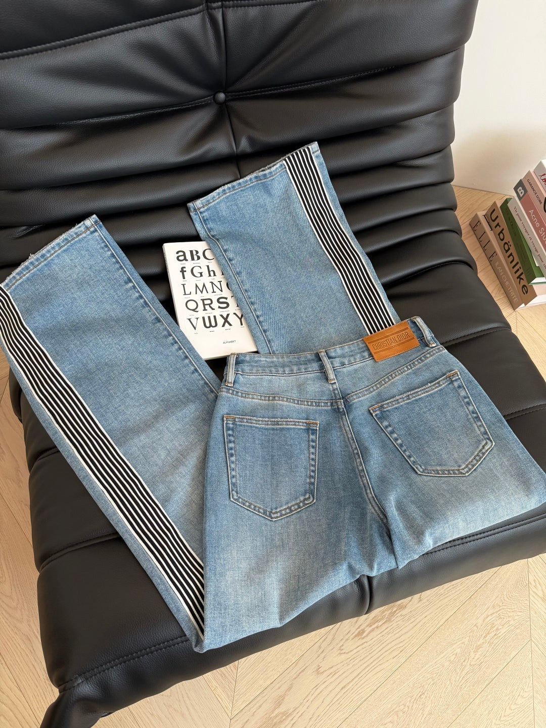 Straight-leg jeans with webbing panels on the sides